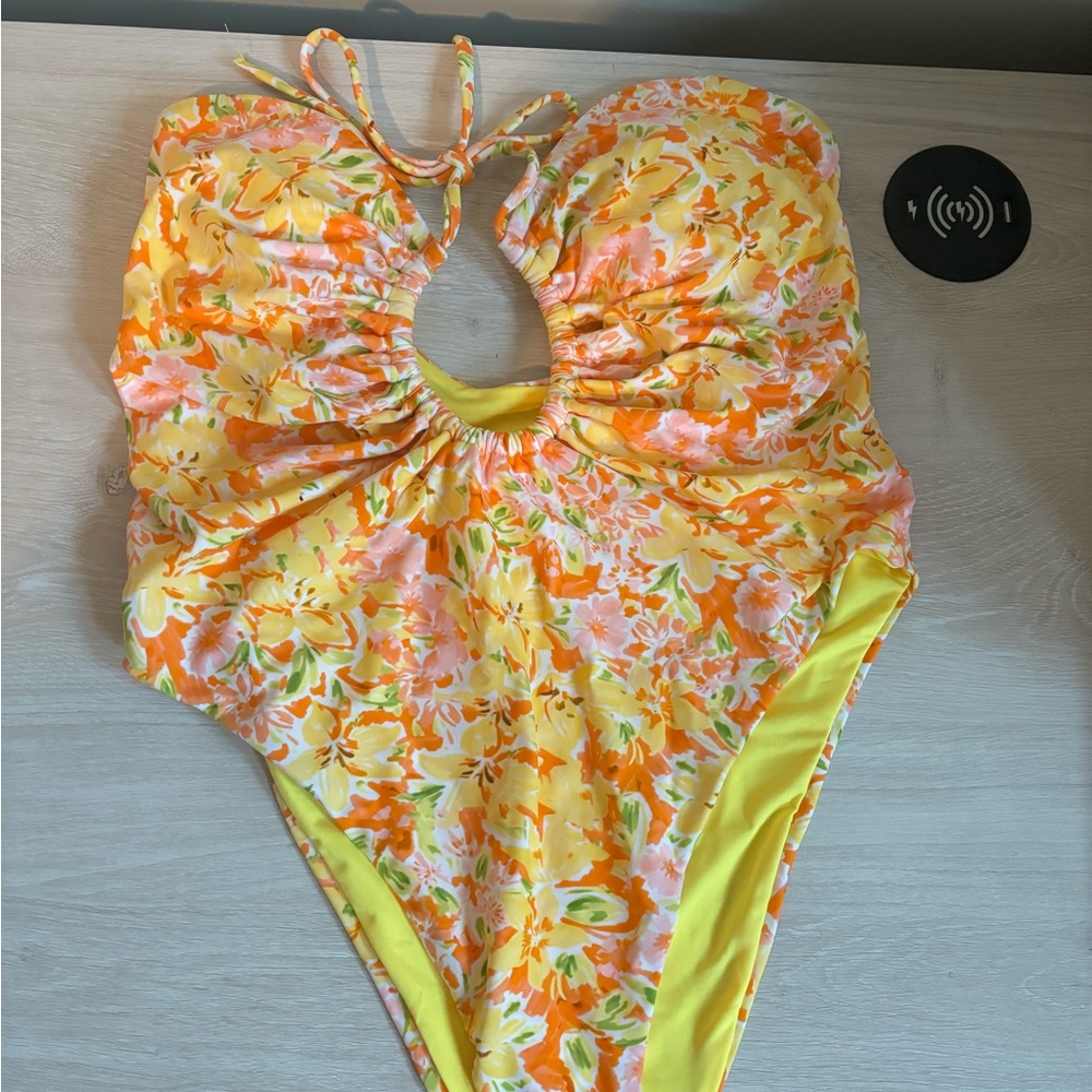 Vibrant Yellow and Orange One-Piece Swimsuit with Plunging Neckline